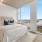 Bedroom with large open windows
