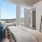 Bedroom with natural lighting and high ceilings