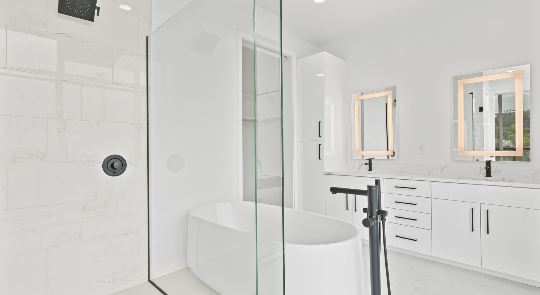 a bathroom with a sink, mirror and shower